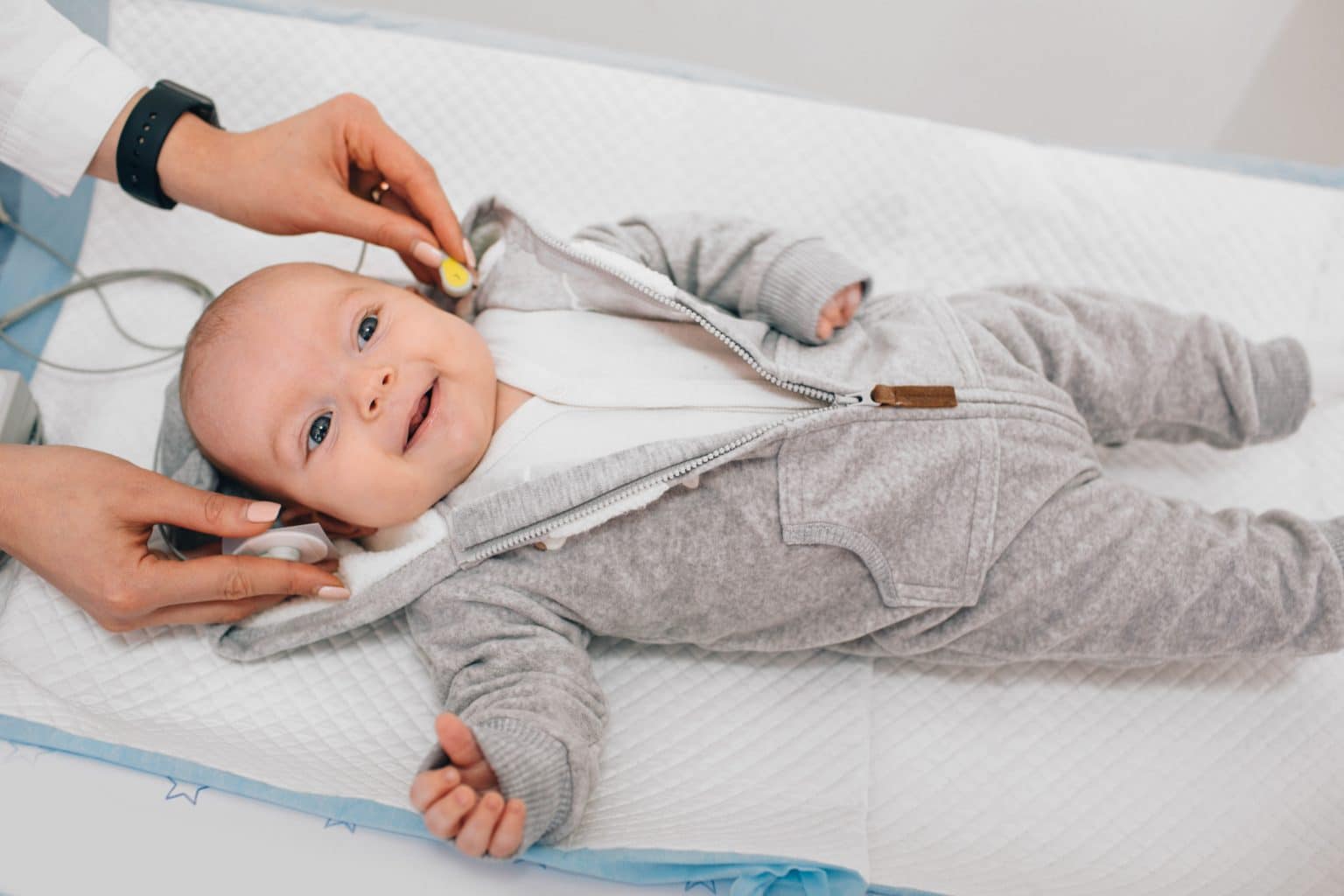 Newborn baby receiving a hearing test